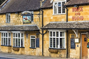 Cotswold stone-built The Horse and Hound inn in the Cotswold village of Broadway Cotswold stone-built The Horse and Hound inn in the Cotswold village of Broadway