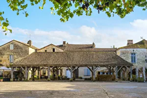 Covered market hall on Place des Cornieres, Monpazier, Dordogne department Covered market hall on Place des Cornieres, Monpazier, Dordogne department