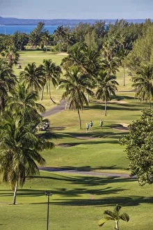 Cuba, Varadero, Golfers at Varadero Golf Course Cuba, Varadero, Golfers at Varadero Golf Course