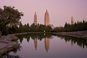 Dali Three Pagodas (San Ta Si) at dusk, Dali, Yunnan Province, China Dali Three Pagodas (San Ta Si) at dusk, Dali, Yunnan Province, China