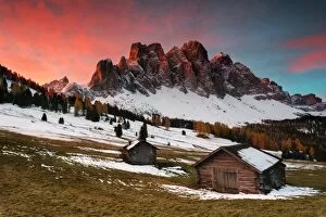 Dawn on the Odle with typical huts. Puez-Odle Natural Park, Trentino Alto Adige, Italy