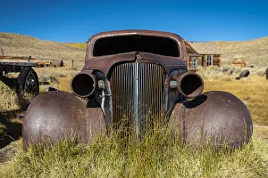 Deserted rusty metallic car at Bodie ghost town, Mono County, Sierra Nevada Deserted rusty metallic car at Bodie ghost town, Mono County, Sierra Nevada