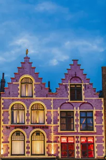 Details of the typical colored houses facades in Markt square in Bruges by night, Belgium Details of the typical colored houses facades in Markt square in Bruges by night, Belgium