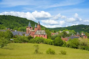 Distinctive red sandstone buildings in Collonges-la-Rouge, CorrAA¨ze, Limousin, France Distinctive red sandstone buildings in Collonges-la-Rouge, CorrAA¨ze, Limousin, France