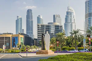 Downtown Dubai and the Arabic Couple Statue (Together by Lufti Romein), Dubai Downtown Dubai and the Arabic Couple Statue (Together by Lufti Romein), Dubai