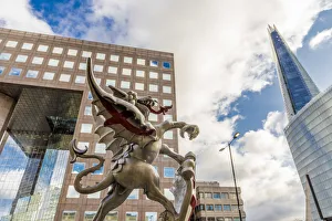 A Dragon Boundary statue and the Shard, London A Dragon Boundary statue and the Shard, London
