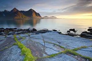 Dramatic Coastal landscape illuminated by Mightnight Sun, Flakstad, Flakstadsoya, Lofoten Dramatic Coastal landscape illuminated by Mightnight Sun, Flakstad, Flakstadsoya, Lofoten