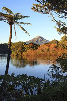 Early morning view of Mount Taranaki from Lake Mangamahoe, New Plymouth, New Zealand Early morning view of Mount Taranaki from Lake Mangamahoe, New Plymouth, New Zealand