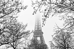 The Eiffel Tower in fog, Paris, France The Eiffel Tower in fog, Paris, France