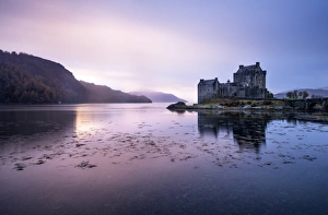 Eilean Donan castle at sunset, Highlands, Scotland Eilean Donan castle at sunset, Highlands, Scotland
