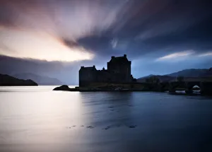 Eilean Donan castle at sunset, Scotland, UK Eilean Donan castle at sunset, Scotland, UK