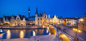 Elevated view of Ghent river with the waterfront buildings reflecting in the water canal Elevated view of Ghent river with the waterfront buildings reflecting in the water canal