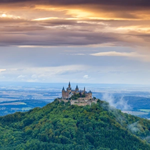 Elevated view towards Hohenzollern Castle & surrounding countryside at sunset, Swabia Elevated view towards Hohenzollern Castle & surrounding countryside at sunset, Swabia