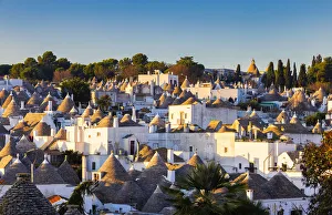 Elevated view of monumental trulli area at sunrise. Unesco World Heritage Site Elevated view of monumental trulli area at sunrise. Unesco World Heritage Site