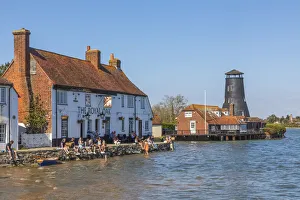 Prints of England, Hampshire, Langstone, Chichester Harbour, View of The Royal Oak Pub and Customers at High Tide Chichester Prints: Chichester Harbour Print: The Royal Oak Pub at High Tide