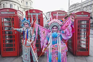 Images Dated 14th April 2015: England, London, Soho, Chinatown, Chinese New Year Festival Parade, Couple Dressed