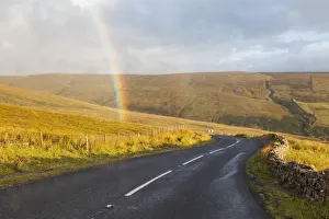 England, North Yorkshire, Swaledale, Empty Road and Rainbow England, North Yorkshire, Swaledale, Empty Road and Rainbow