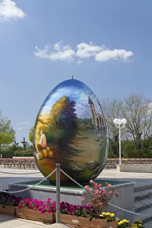 Europe, Bosnia and Herzegovina, Medjugorje. Easter egg in front of St. James Church Europe, Bosnia and Herzegovina, Medjugorje. Easter egg in front of St. James Church