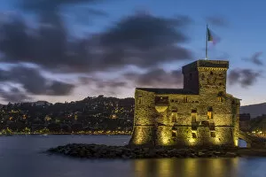 Rapallo Collection: Europe, Italy, Rapallo. Blue hour with castle