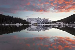 Images Dated 21st November 2014: Europe, Italy, Veneto, Auronzo di Cadore. Amazing reflection at sunset on the lake of Misurina