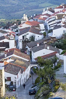Europe, Portugal, Alentejo, Portalegre, Marvao village - a man walking along a cobbled Europe, Portugal, Alentejo, Portalegre, Marvao village - a man walking along a cobbled