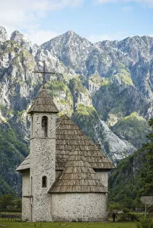 Albania Collection: Exterior of Theth Village Church with The Accursed Mountains in background, Theth