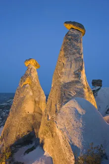 Fairy chimneys known as The Three Beauties, near Goreme, Cappadocia, Turkey Fairy chimneys known as The Three Beauties, near Goreme, Cappadocia, Turkey