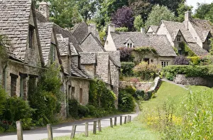 Famous Arlington Row of the 17th century stone cottages with steeply pitched roofs Famous Arlington Row of the 17th century stone cottages with steeply pitched roofs