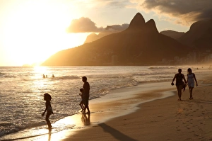 The famous Ipanema Beach in Rio de Janeiro with the Two Brothers Mountain in The famous Ipanema Beach in Rio de Janeiro with the Two Brothers Mountain in