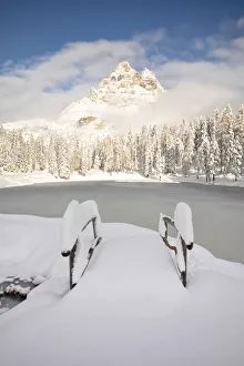 a famous Tre Cime of Lavaredo seen from the Antorno lake in winter time, Dolomiti a famous Tre Cime of Lavaredo seen from the Antorno lake in winter time, Dolomiti