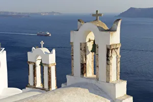 Ferry and church in Oia, Santorini, Kyclades, South Aegean, Greece, Europe Ferry and church in Oia, Santorini, Kyclades, South Aegean, Greece, Europe