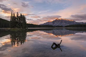 First light illuminates Mount Rundle, and reflects in Two Jack Lake, Banff National Park First light illuminates Mount Rundle, and reflects in Two Jack Lake, Banff National Park
