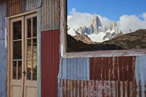 Cerro Gallery: The Fitz Roy mountain mirrored on the window of the Estancia Bonanza mountain retreat