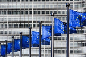 Flags of European Union weaving outside the European Commission building, Brussels Flags of European Union weaving outside the European Commission building, Brussels
