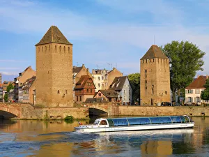 France, Alsace, Strasbourg, Pont couverts, Tourist boat France, Alsace, Strasbourg, Pont couverts, Tourist boat