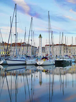 France, poitou-Charentes, La Rochelle, town reflected in harbour at dusk France, poitou-Charentes, La Rochelle, town reflected in harbour at dusk