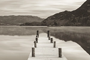 Frosty jetty on Ullswater at dawn, Lake District, Cumbria, England. Winter (November) Frosty jetty on Ullswater at dawn, Lake District, Cumbria, England. Winter (November)