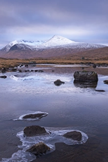 Frozen lochan reflecting the Black Mount, Rannoch Moor, Scotland. Winter (November) Frozen lochan reflecting the Black Mount, Rannoch Moor, Scotland. Winter (November)