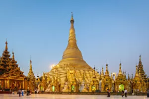 Rangoon Collection: Gilded Shwedagon Pagoda against clear sky at dawn, Yangon, Yangon Region, Myanmar