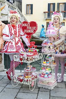 Two girls pose as pastry sellers during the Venice Carnival, Venice; veneto; Italy