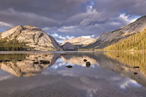 Granite mountains reflected in Tenaya Lake, Yosemite National Park, California, USA Granite mountains reflected in Tenaya Lake, Yosemite National Park, California, USA