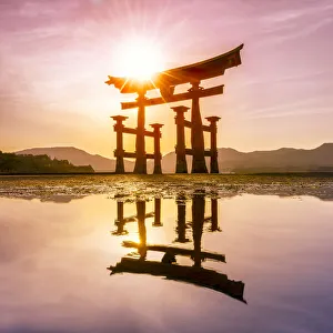 The great Torii at sunset, Miyajima island, Hiroshima Prefecture, Japan The great Torii at sunset, Miyajima island, Hiroshima Prefecture, Japan