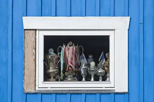 Greenland, Disko Bay, Ilulissat, window with trophies Greenland, Disko Bay, Ilulissat, window with trophies