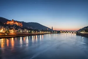 Heidelberg castle and Neckar river at dusk, Baden-Wurttemberg, Germany Heidelberg castle and Neckar river at dusk, Baden-Wurttemberg, Germany