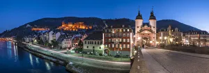 Heidelberg castle and Old Bridge at dusk alongside the Neckar river, Baden-Wurttemberg Heidelberg castle and Old Bridge at dusk alongside the Neckar river, Baden-Wurttemberg
