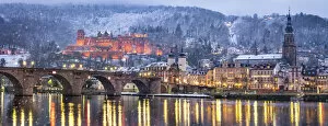 Illuminated Collection: Heidelberg castle in winter with the Old Bridge and Church of the Holy Spirit along