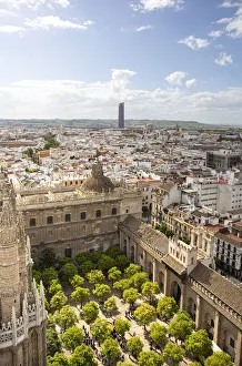 A high view of Seville Cathedrals Patio de los Naranjos, from Giralda Tower A high view of Seville Cathedrals Patio de los Naranjos, from Giralda Tower