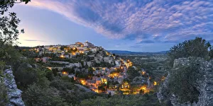 The hilltop village of Gordes at twilight (Apt, Vaucluse department The hilltop village of Gordes at twilight (Apt, Vaucluse department