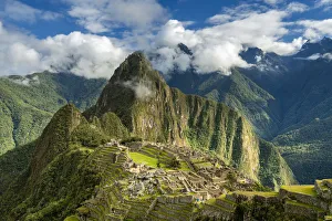 Historic ancient archeological Incan Machu Picchu on mountain in Andes, Cuzco Region Historic ancient archeological Incan Machu Picchu on mountain in Andes, Cuzco Region