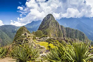 Historic ancient Incan Machu Picchu on mountain in Andes, Cuzco Region, Peru Historic ancient Incan Machu Picchu on mountain in Andes, Cuzco Region, Peru